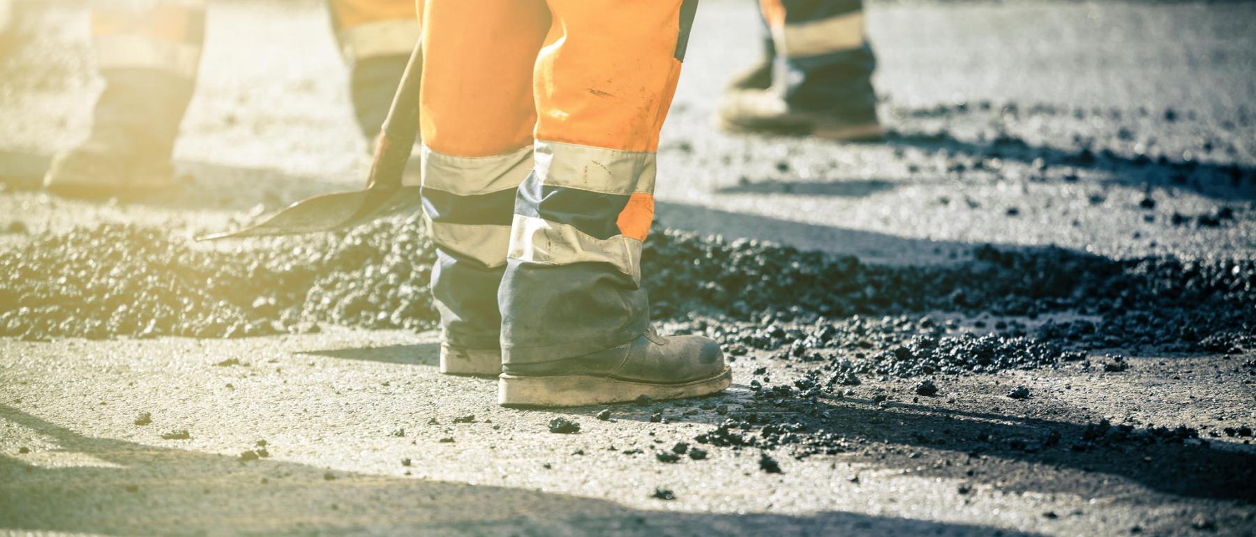 team work on road construction